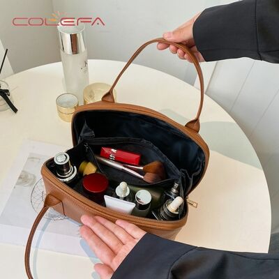 2026 New Arrival Large Capacity Commuting Makeup Bag Premium-Quality Boston-Style Versatile Pillow Cosmetic Bag LOGO Available